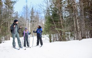 A group of friends enjoying a day out at the Great Glen Trails Outdoor Center.